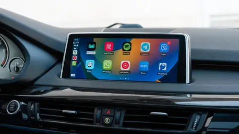 CarPlay ekranyndaky çaň ikonkasynyň manysy näme?